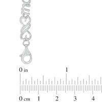 0.18 CT. T.W. Diamond Heart-Shaped Infinity with "MOM" Bracelet in Sterling Silver - 7.5"|Peoples Jewellers