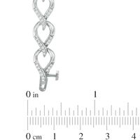 0.95 CT. T.W. Diamond Flame Link Bracelet in 10K White Gold - 7.25"|Peoples Jewellers