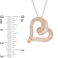 0.50 CT. T.W. Baguette and Round Diamond Tilted Heart Pendant in 10K Rose Gold|Peoples Jewellers