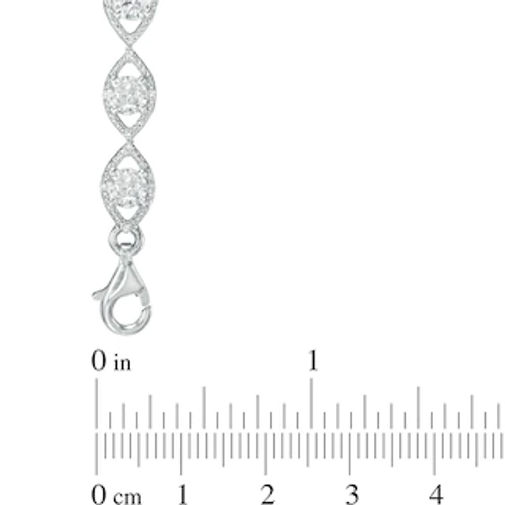 Lab-Created White Sapphire and 0.09 CT. T.W. Diamond Oval Link Bracelet in Sterling Silver - 7.5"|Peoples Jewellers