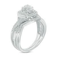 5.0mm White Lab-Created Sapphire and 0.11 CT. T.W. Diamond Frame Twist Bridal Set in Sterling Silver|Peoples Jewellers