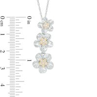 0.11 CT. T.W. Diamond Triple Pinwheel Flower Swirl Drop Pendant in Sterling Silver and 10K Gold|Peoples Jewellers