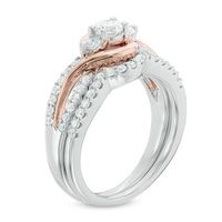 0.70 CT. T.W. Diamond Three Stone Swirl Bridal Set in 10K White Gold|Peoples Jewellers