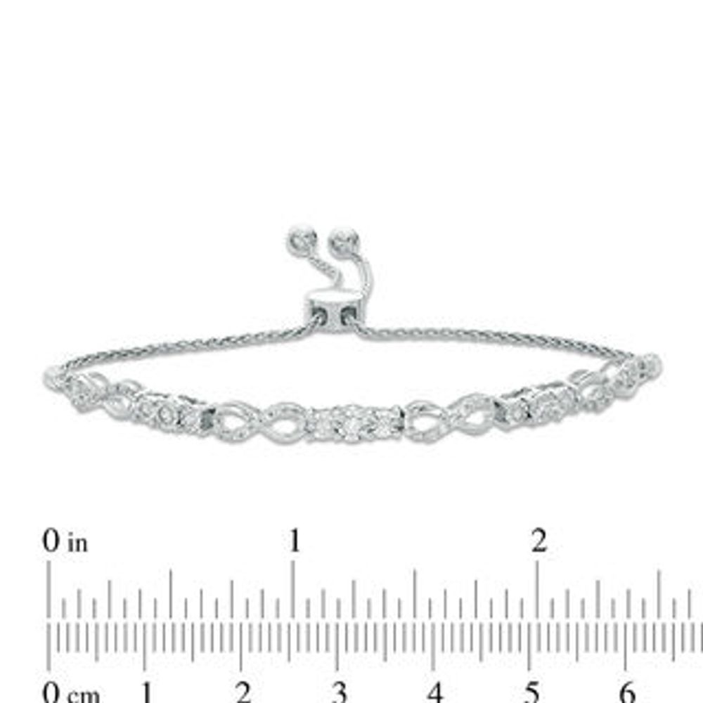 0.37 CT. T.W. Diamond Three Stone Infinity Bolo Bracelet in 10K White Gold - 9.5"|Peoples Jewellers