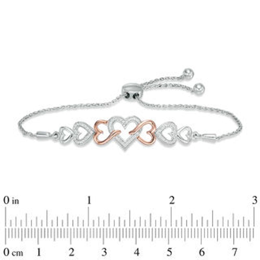 0.11 CT. T.W. Diamond Intertwining Heart Bolo Bracelet in Sterling Silver and 10K Rose Gold - 9.5"|Peoples Jewellers