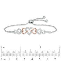 0.11 CT. T.W. Diamond Intertwining Heart Bolo Bracelet in Sterling Silver and 10K Rose Gold - 9.5"|Peoples Jewellers