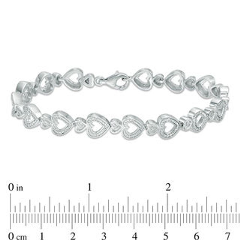 0.15 CT. T.W. Diamond Heart Bracelet in Sterling Silver - 7.5"|Peoples Jewellers