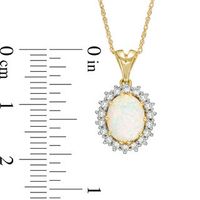 Oval Lab-Created Opal and White Sapphire Sunburst Frame Pendant in 10K Gold|Peoples Jewellers