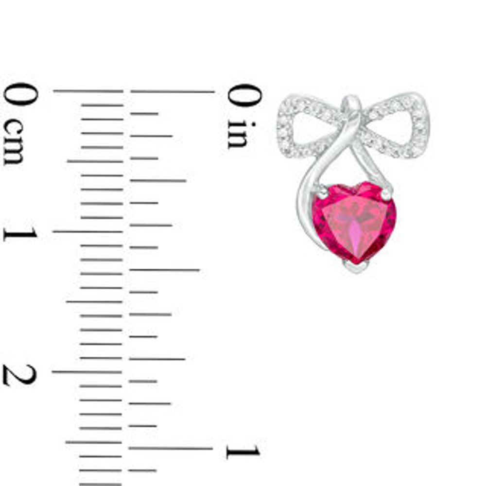 6.0mm Heart-Shaped Lab-Created Ruby and 0.11 CT. T.W. Diamond Bow Drop Earrings in Sterling Silver|Peoples Jewellers