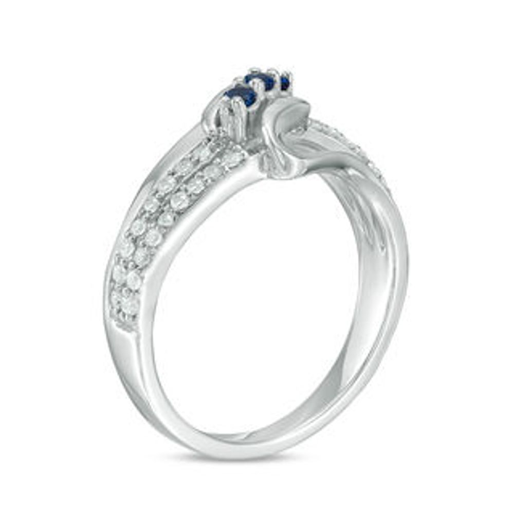 Lab-Created Blue Sapphire and 0.23 CT. T.W. Diamond Three Stone Split Shank Ring in Sterling Silver|Peoples Jewellers