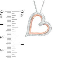 0.23 CT. T.W. Baguette and Round Diamond Tilted Heart Pendant in Sterling Silver and 10K Rose Gold|Peoples Jewellers