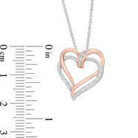 0.15 CT. T.W. Baguette and Round Diamond Tilted Double Heart Pendant in Sterling Silver with 14K Rose Gold Plate|Peoples Jewellers