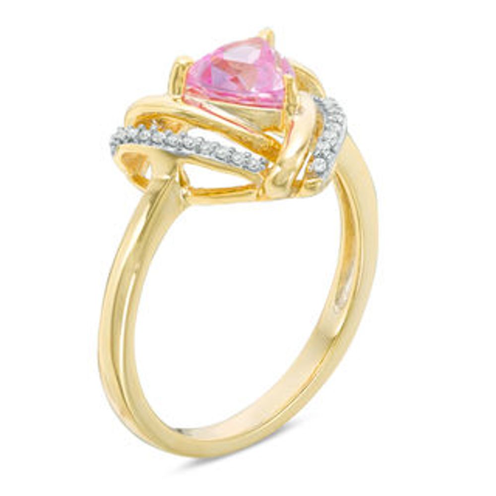 6.0mm Trillion-Cut Lab-Created Pink Sapphire and 0.09 CT. T.W. Diamond Swirl Frame Ring in 10K Gold|Peoples Jewellers