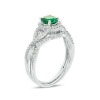 5.2mm Lab-Created Emerald and 0.23 CT. T.W. Diamond Twist Shank Bridal Set in 10K White Gold|Peoples Jewellers