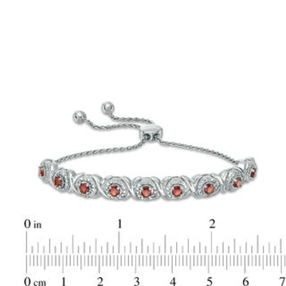 Garnet and 0.09 CT. T.W. Diamond Frame Bolo Bracelet in Sterling Silver - 9.5"|Peoples Jewellers