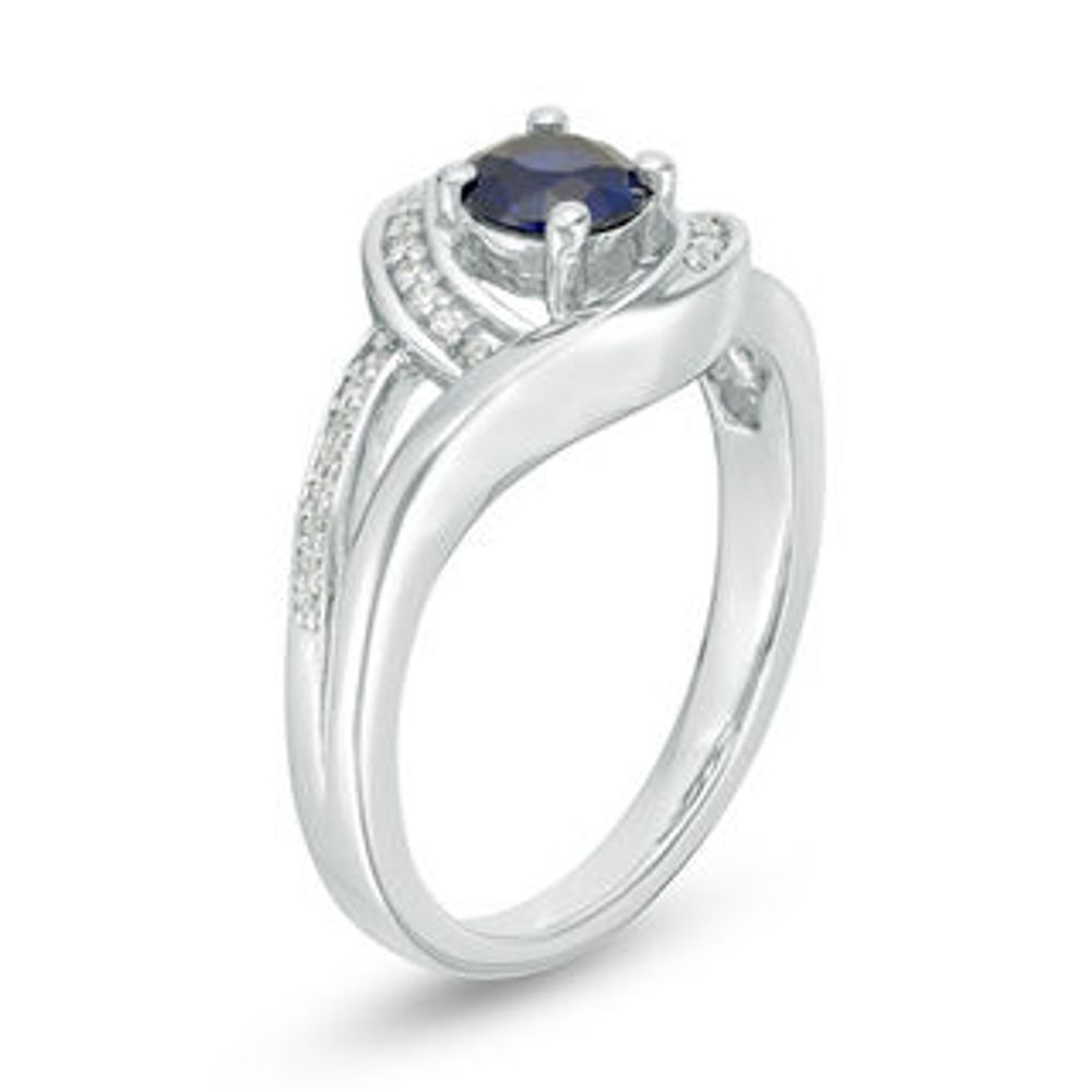 5.0mm Lab-Created Blue Sapphire and 0.09 CT. T.W. Diamond Swirl Frame Split Shank Ring in Sterling Silver|Peoples Jewellers