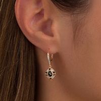 1.23 CT. T.W. Oval Enhanced Black and White Diamond Frame Vintage-Style Drop Earrings in 10K Rose Gold|Peoples Jewellers