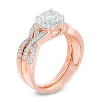 7.0mm Lab-Created White Sapphire and 0.145 CT. T.W. Diamond Twist Bridal Set in 10K Rose Gold|Peoples Jewellers