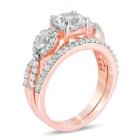 Lab-Created White Sapphire and 0.45 CT. T.W. Diamond Twist Bridal Set in 10K Rose Gold|Peoples Jewellers