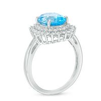 Oval Swiss Blue Topaz and Lab-Created White Sapphire Sunburst Frame Ring in Sterling Silver|Peoples Jewellers