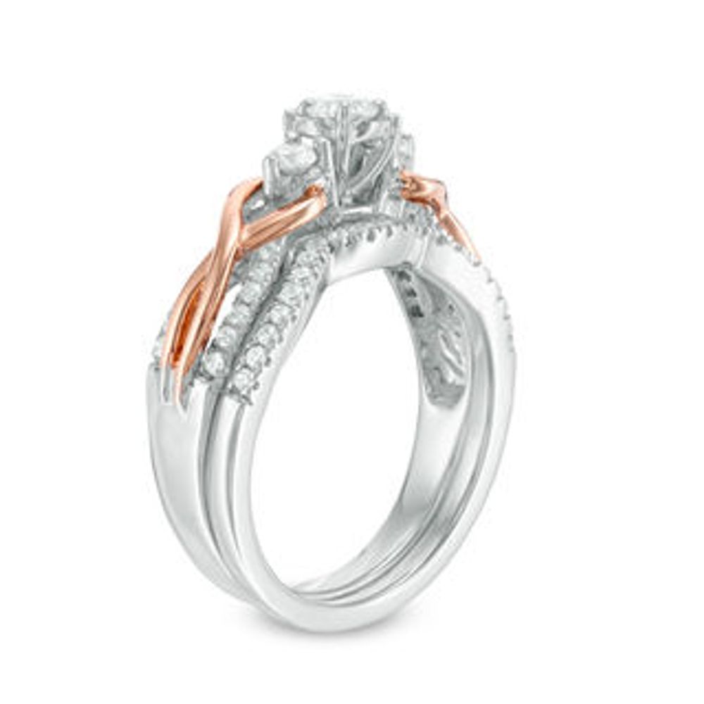 0.45 CT. T.W. Diamond Three Stone Loop Twist Bridal Set in 10K Two-Tone Gold|Peoples Jewellers