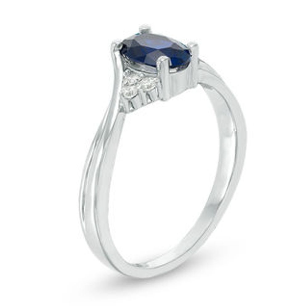 Oval Lab-Created Blue Sapphire and 0.085 CT. T.W. Diamond Tri-Sides Promise Ring in 10K White Gold|Peoples Jewellers