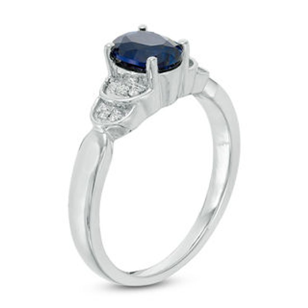 Oval Lab-Created Blue Sapphire and 0.065 CT. T.W. Diamond Layered Shank Promise Ring in 10K White Gold|Peoples Jewellers
