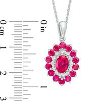 Oval Lab-Created Ruby and 0.04 CT. T.W. Diamond Double Frame Pendant in 10K White Gold|Peoples Jewellers