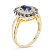 Oval Lab-Created Blue Sapphire and 0.18 CT. T.W. Diamond Double Frame Ring in 10K Gold|Peoples Jewellers