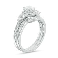 5.0mm Lab-Created White Sapphire and 0.145 CT. T.W. Diamond Frame Bridal Set in Sterling Silver|Peoples Jewellers