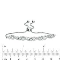 0.118 CT. T.W. Diamond Love Knot Infinity Bolo Bracelet in Sterling Silver - 9.5"|Peoples Jewellers