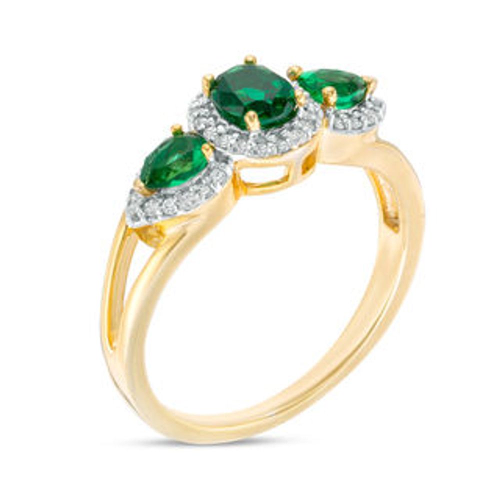 Oval and Pear-Shaped Lab-Created Emerald and 0.14 CT. T.W. Diamond Frame Three Stone Ring in 10K Gold|Peoples Jewellers