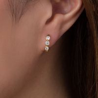 Lab-Created White Sapphire Three Stone Hoop Earrings in 10K Gold|Peoples Jewellers