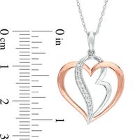 0.10 CT. T.W. Diamond Double Heart Pendant in 10K Two-Tone Gold|Peoples Jewellers