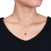 6.0mm Lab-Created Ruby and 0.10 CT. T.W. Diamond Cushion Frame Pendant in 10K Gold - 17"|Peoples Jewellers