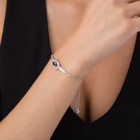 5.0mm Lab-Created Blue Sapphire and 0.085 CT. T.W. Diamond Loop Knot Frame Bolo Bracelet in Sterling Silver - 9.5"|Peoples Jewellers