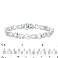 0.46 CT. T.W. Diamond Heart Double Knot Bracelet in Sterling Silver|Peoples Jewellers