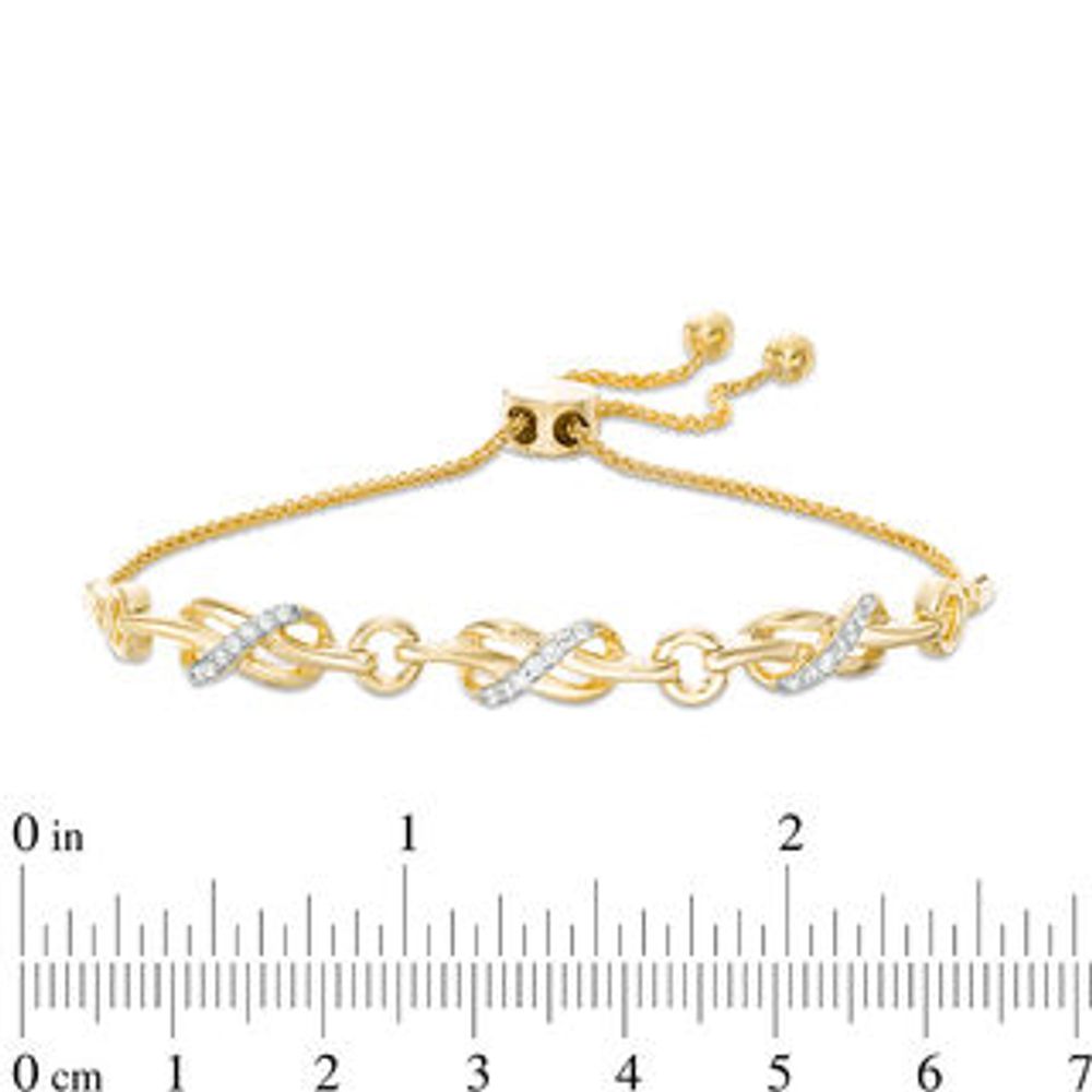 0.145 CT. T.W. Diamond Triple Infinity Knot Bolo Bracelet in Sterling Silver with 14K Gold Plate - 9.5"|Peoples Jewellers