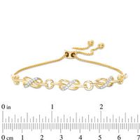 0.145 CT. T.W. Diamond Triple Infinity Knot Bolo Bracelet in Sterling Silver with 14K Gold Plate - 9.5"|Peoples Jewellers