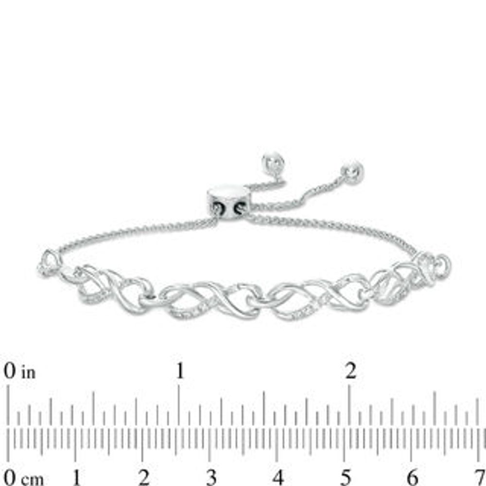 0.065 CT. T.W. Diamond Infinity Knot Bolo Bracelet in Sterling Silver - 9.5"|Peoples Jewellers