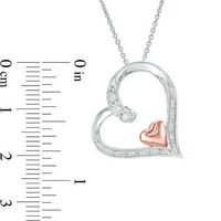 0.10 CT. T.W. Diamond Tilted Heart Within Heart Pendant in Sterling Silver and 10K Rose Gold|Peoples Jewellers