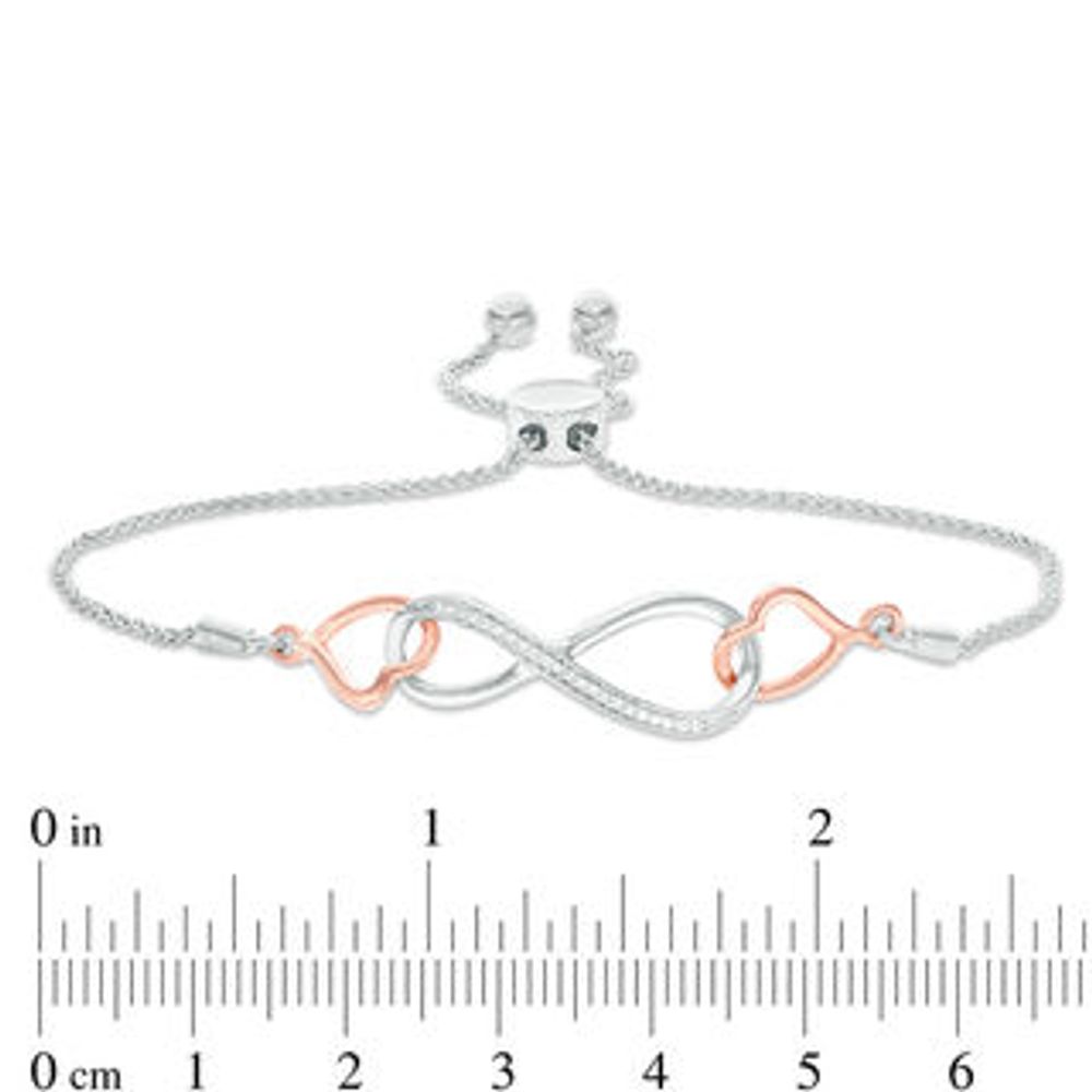 0.04 CT. T.W. Diamond Interlocking Sideways Heart and Infinity Bolo Bracelet in Sterling Silver and 10K Rose Gold - 9.5"|Peoples Jewellers