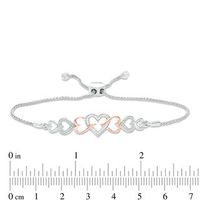 0.04 CT. T.W. Diamond Intertwining Sideways Heart Bolo Bracelet in Sterling Silver and 10K Rose Gold - 9.5"|Peoples Jewellers