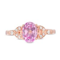 Oval Lab-Created Pink Sapphire and 0.086 CT. T.W. Diamond Leaf Sides Ring in 10K Rose Gold|Peoples Jewellers