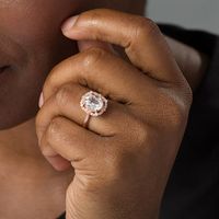 Oval Lab-Created White Sapphire and 0.148 CT. T.W. Diamond Frame Vintage-Style Ring in 10K Rose Gold|Peoples Jewellers