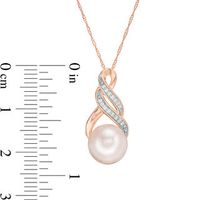 9.0-9.5mm Freshwater Cultured Pearl and 0.06 CT. T.W. Diamond Infinity Twist Pendant in 10K Rose Gold|Peoples Jewellers