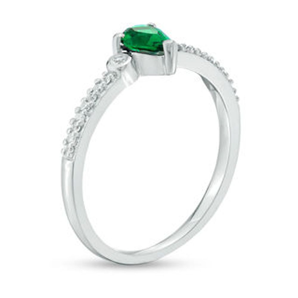 Pear-Shaped Lab-Created Emerald and 0.04 CT. T.W. Diamond Bezel-Set Side Accent Promise Ring in Sterling Silver|Peoples Jewellers