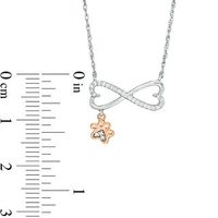 0.067 CT. T.W. Diamond Sideways Heart Infinity with Paw Print Dangle Necklace in Sterling Silver and 10K Rose Gold|Peoples Jewellers