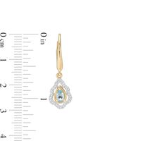 Pear-Shaped Swiss Blue Topaz and 0.18 CT. T.W. Diamond Scallop Frame Ornate Drop Earrings in 10K Gold|Peoples Jewellers