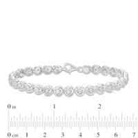 0.086 CT. T.W. Diamond Love Knot Tennis Bracelet in Sterling Silver - 7.5"|Peoples Jewellers